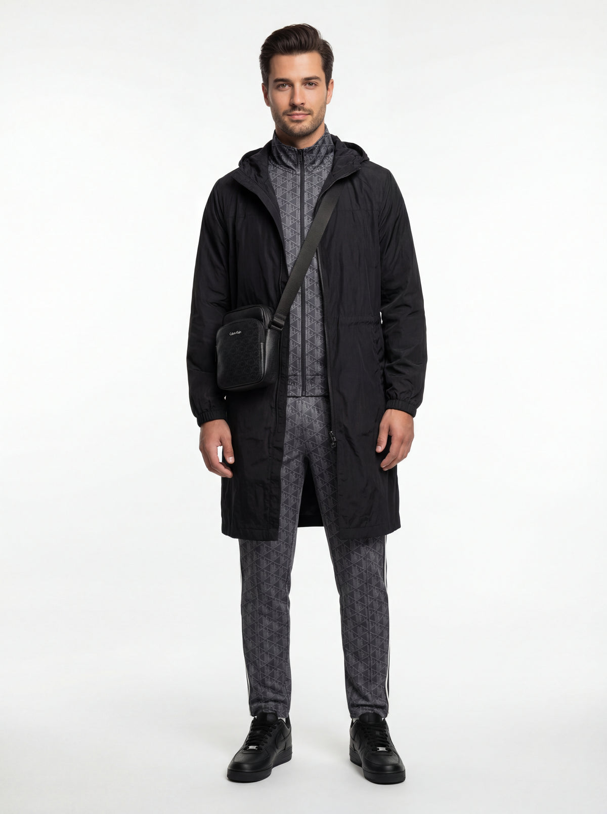 CW2288 001 Air + Lacoste Tuta Uomo + Calvin Klein Tracolla - 01